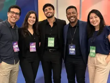 Em evento com outros profissionais